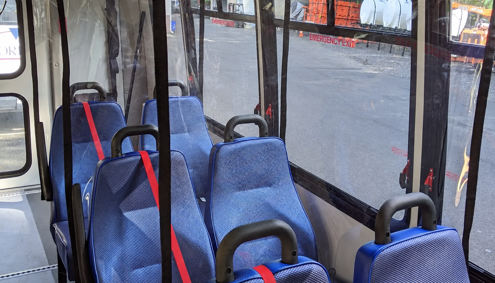 Original Soft Shield barriers installed inside a passenger bus