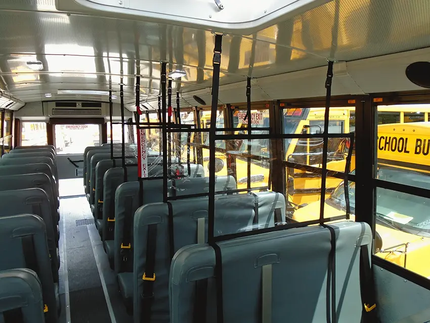 Soft Shield panels installed in multiple seating areas of a school bus