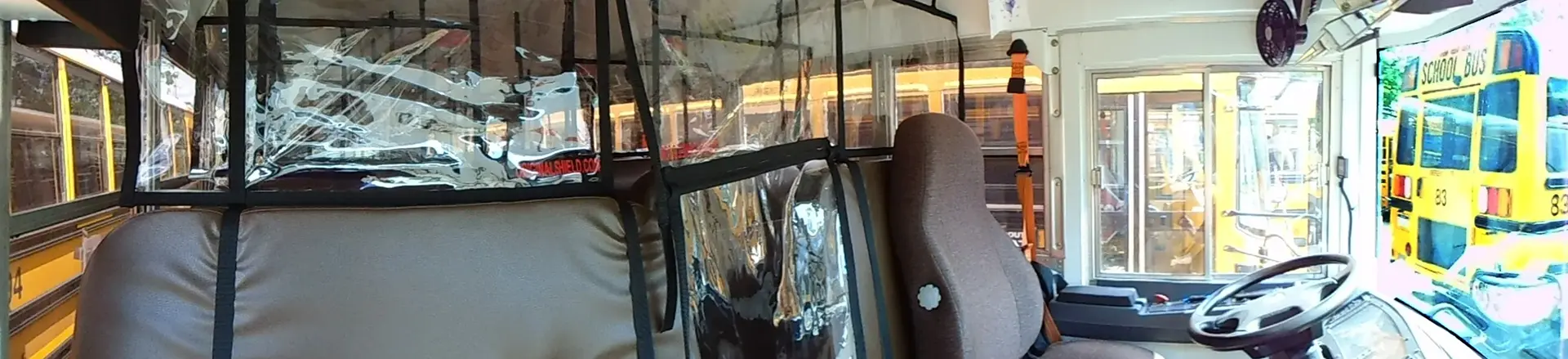 Panoramic Soft Shield installation around a bus driver area